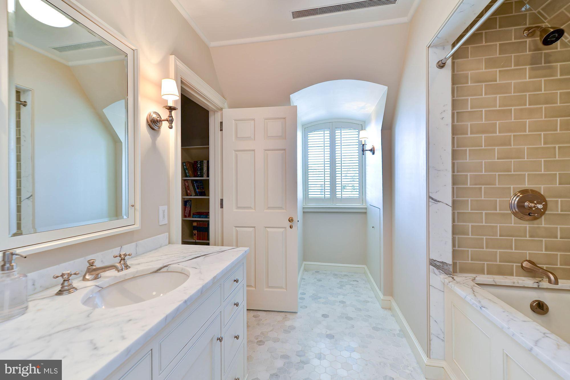 1901 24th Street Northwest Washington, DC 20008 - Photo 24 of 27 a bathroom with a sink and a bathtub