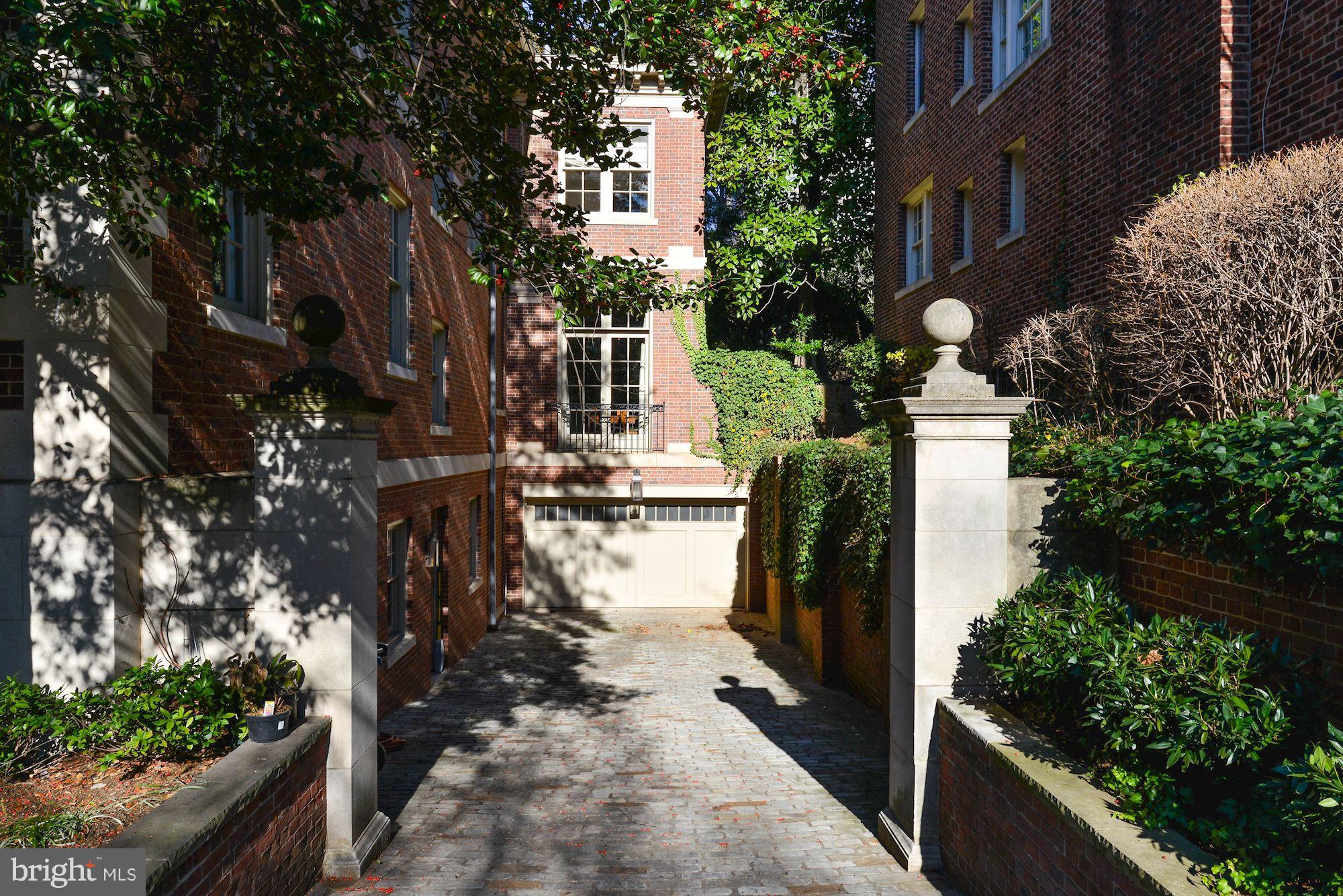 1901 24th Street Northwest Washington, DC 20008 - Photo 26 of 27 a front view of a house with a yard