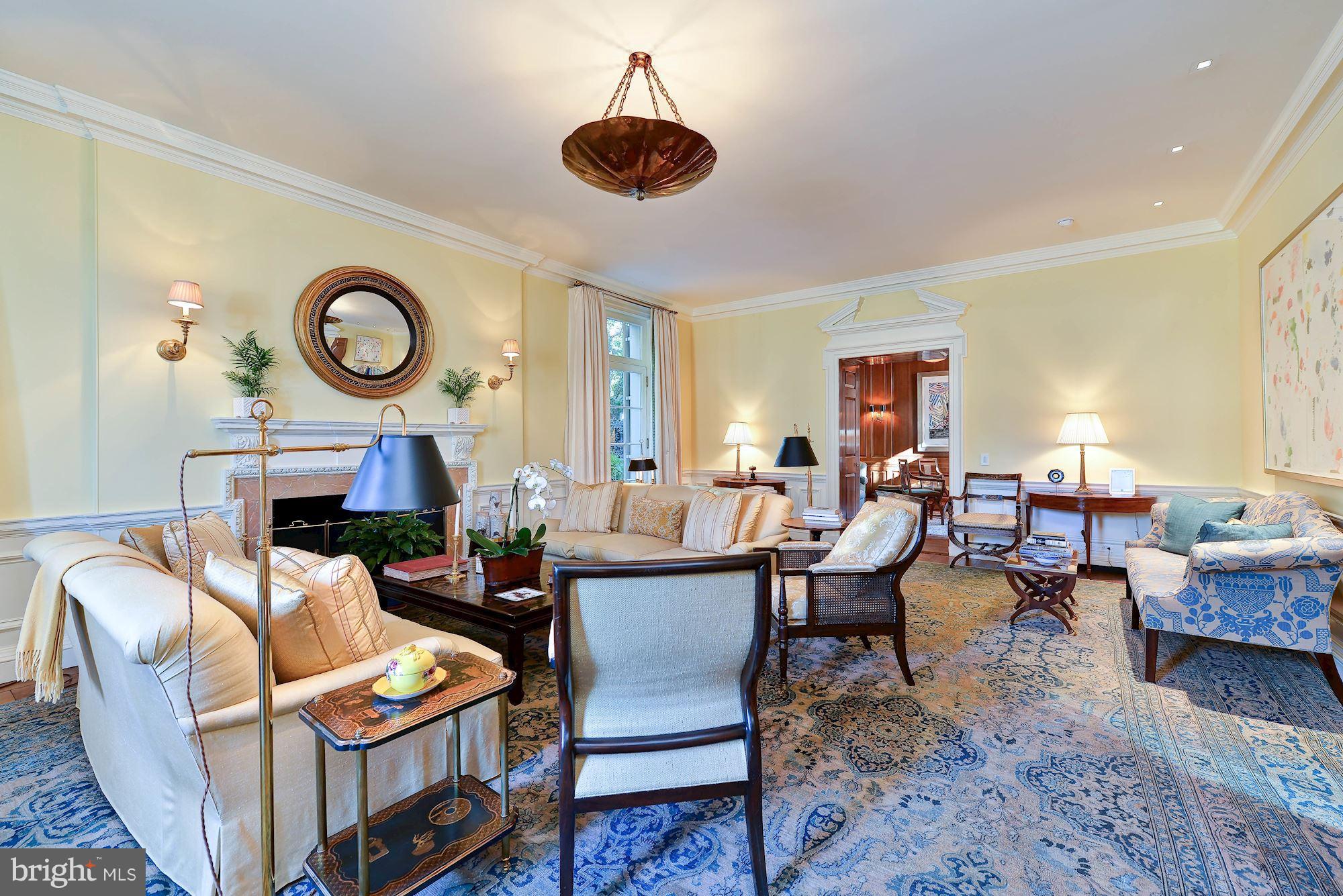 1901 24th Street Northwest Washington, DC 20008 - Photo 4 of 27 a living room with fireplace furniture and a large window