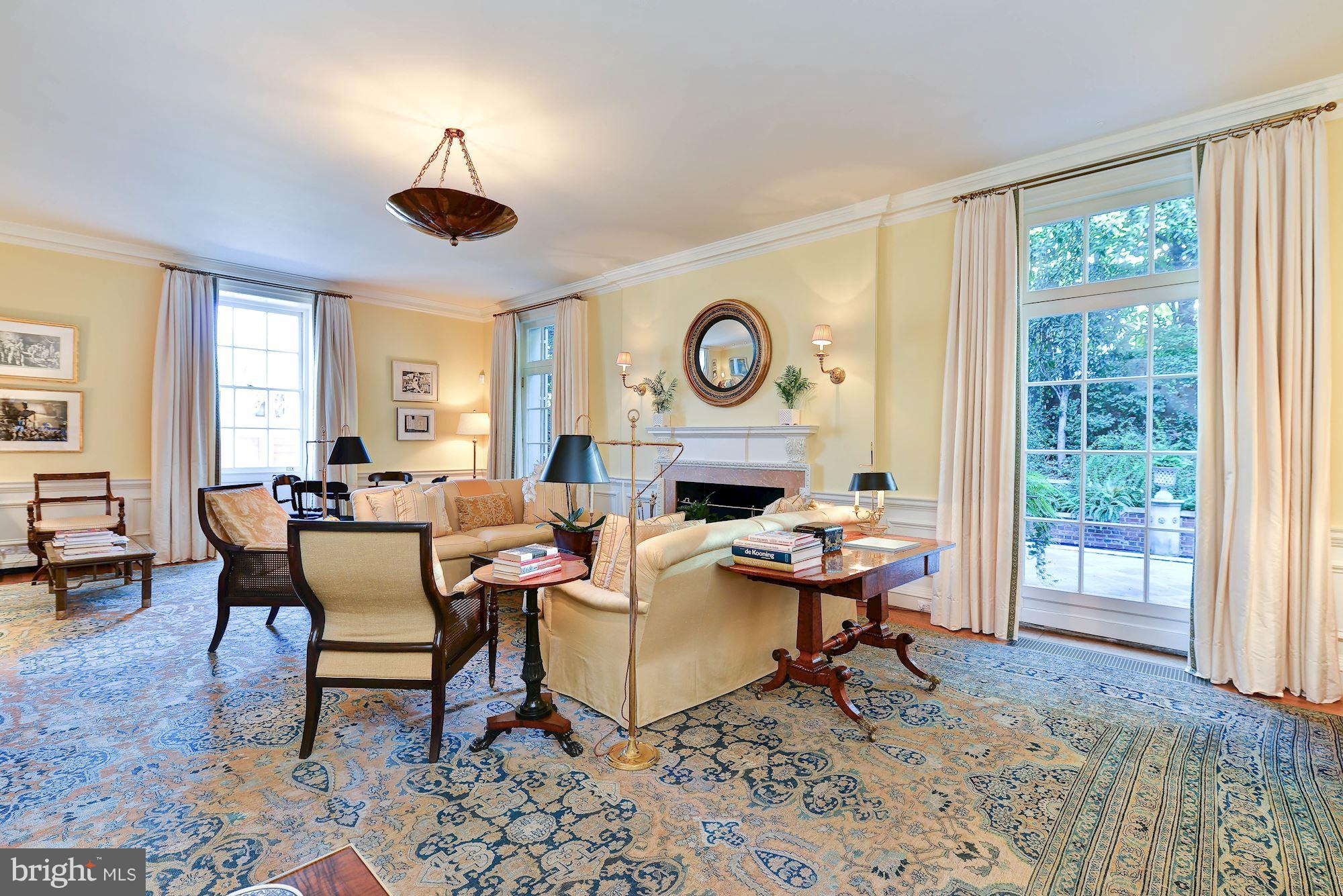 1901 24th Street Northwest Washington, DC 20008 - Photo 5 of 27 a living room with fireplace furniture and a large window