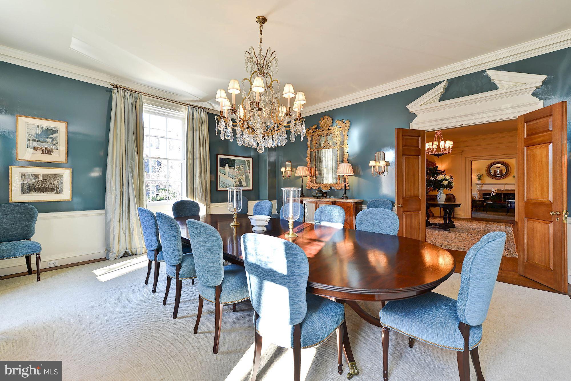 1901 24th Street Northwest Washington, DC 20008 - Photo 8 of 27 a view of a dining room with furniture and a chandelier