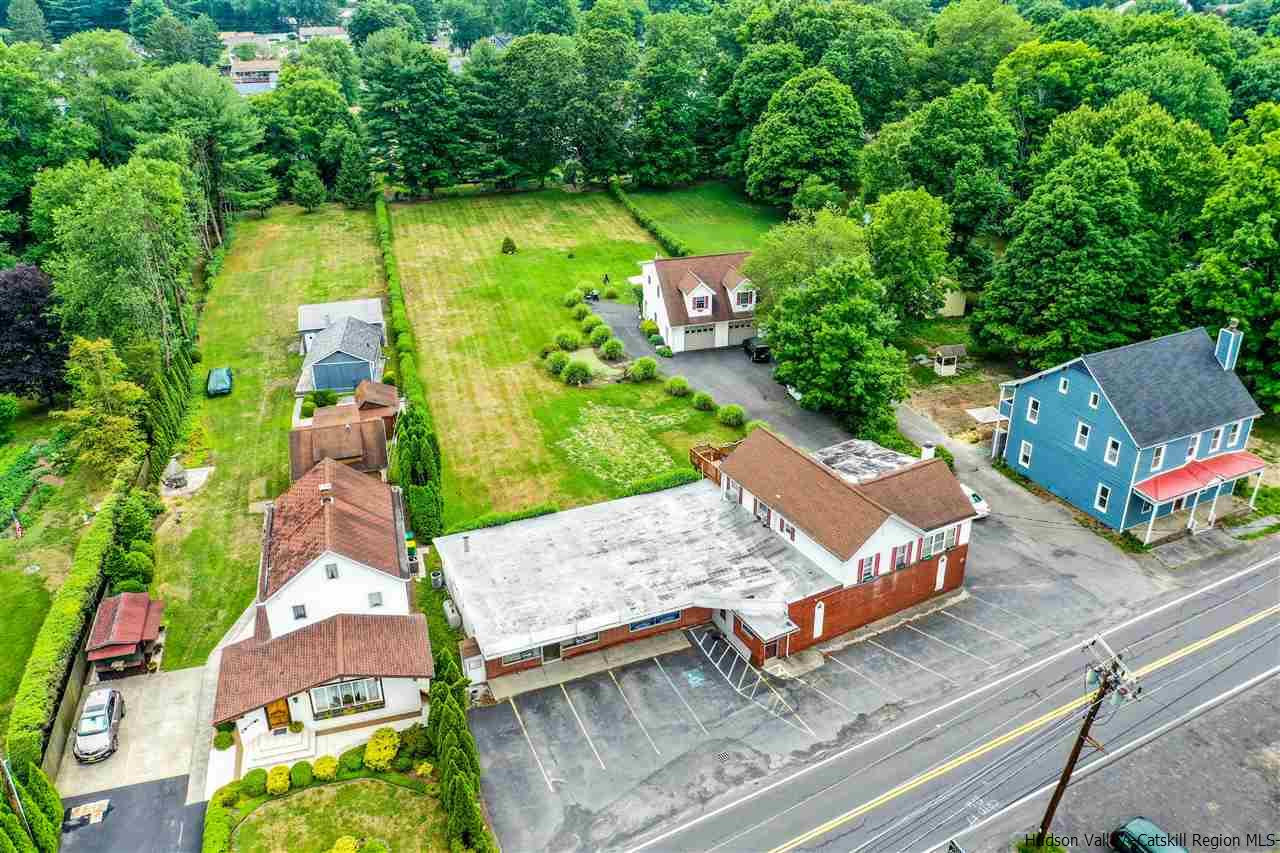 an aerial view of a house having yard