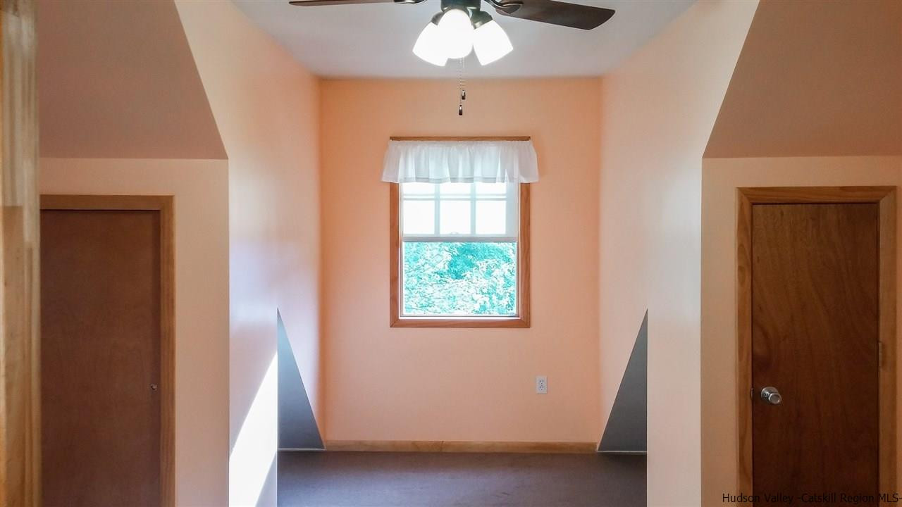 735 Springtown Road Tillson, NY 12486 - Photo 20 of 35 a view of an empty room with a window
