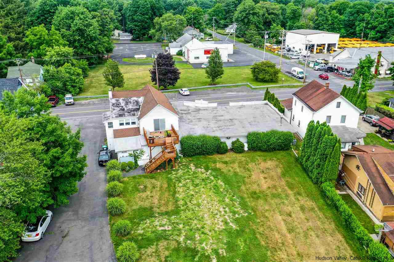 735 Springtown Road Tillson, NY 12486 - Photo 22 of 35 an aerial view of residential house with outdoor space and swimming pool