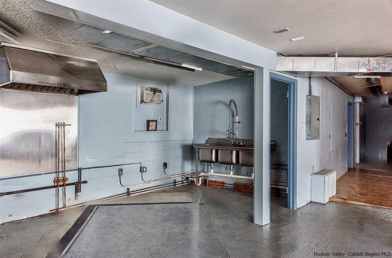 735 Springtown Road Tillson, NY 12486 - Photo 27 of 35 a view of a hallway with a living room