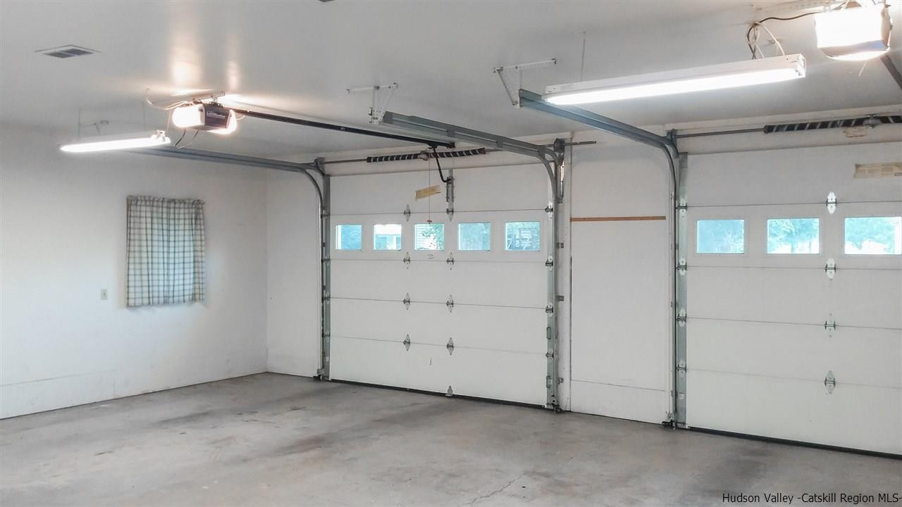 735 Springtown Road Tillson, NY 12486 - Photo 29 of 35 an empty room with windows