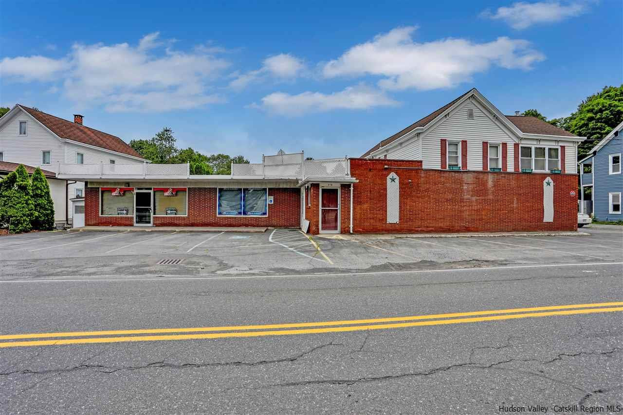 735 Springtown Road Tillson, NY 12486 - Photo 3 of 35 a front view of a house with a yard