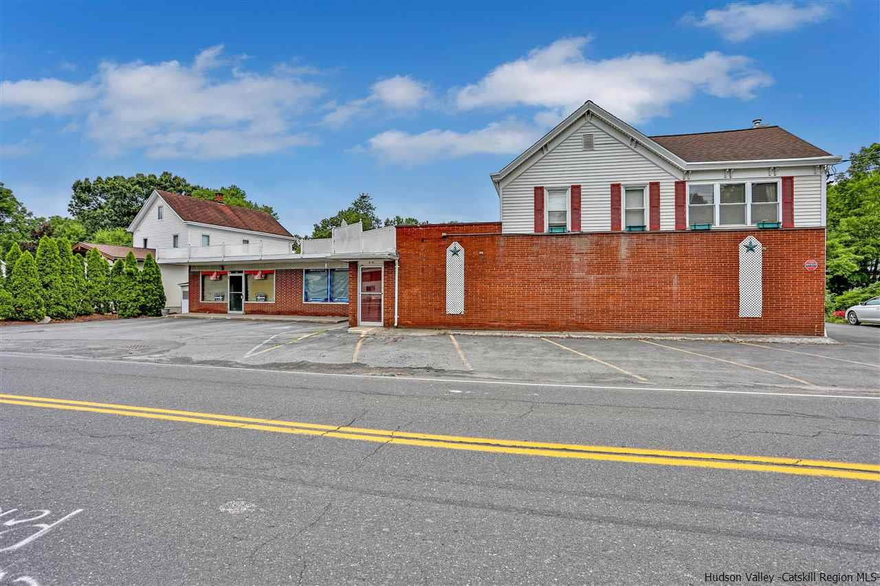735 Springtown Road Tillson, NY 12486 - Photo 4 of 35 front view of a house with a yard