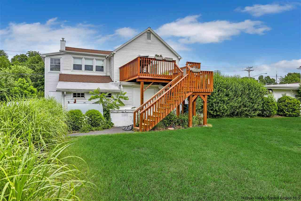 735 Springtown Road Tillson, NY 12486 - Photo 5 of 35 a view of a big house with a big yard and potted plants