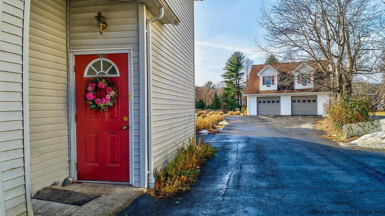 735 Springtown Road Tillson, NY 12486 - Photo 6 of 35 a front view of a house with a yard