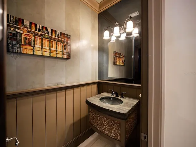 a spacious bedroom with a large bed and a large window