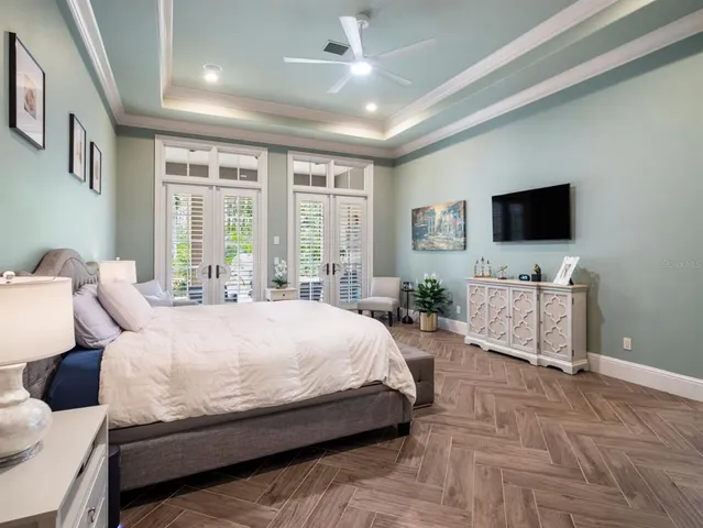 a spacious bathroom with a double vanity sink and a mirror