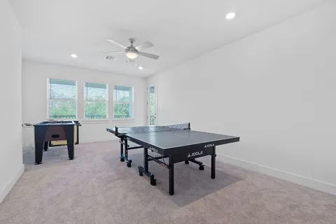 a room with furniture and a large window