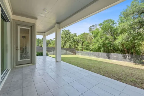 a view of a house with a glass door