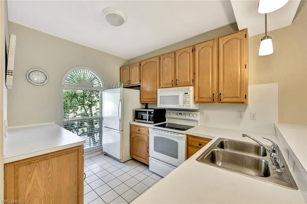 8228 Twelve Oaks Circle, Unit 323 Naples, FL 34113 - Photo 3 of 26 Kitchen