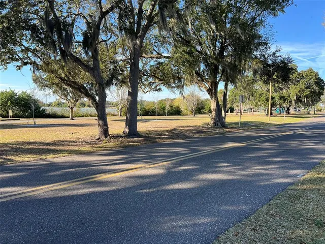 a view of road with trees