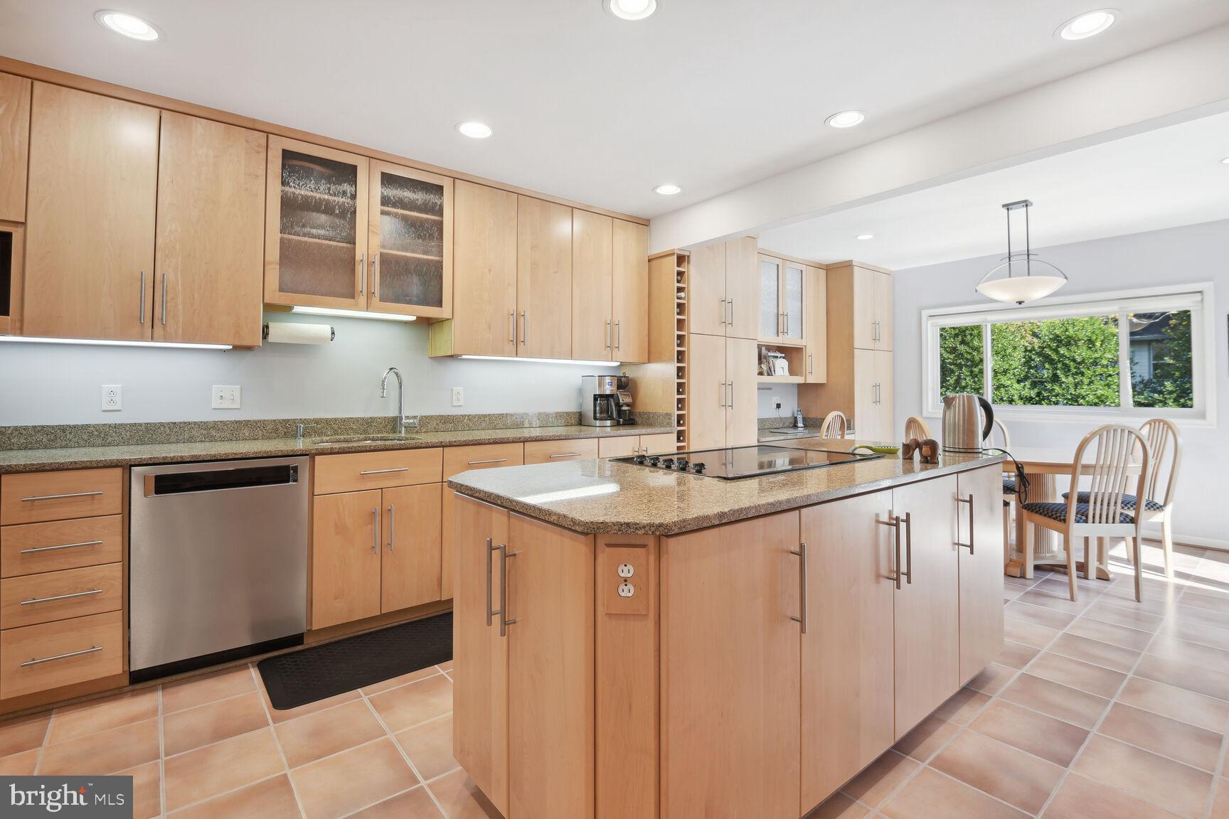1507 Blue Meadow Road Potomac, MD 20854 - Photo 14 of 36 a kitchen with granite countertop a sink and cabinets