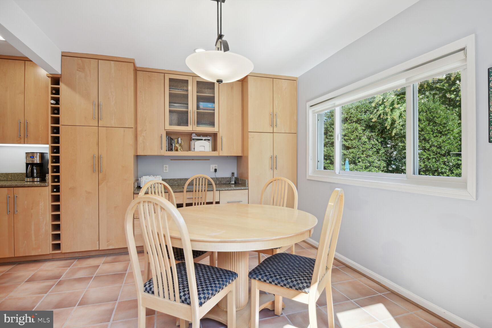 1507 Blue Meadow Road Potomac, MD 20854 - Photo 17 of 36 a view of a dining room with furniture window and outside view