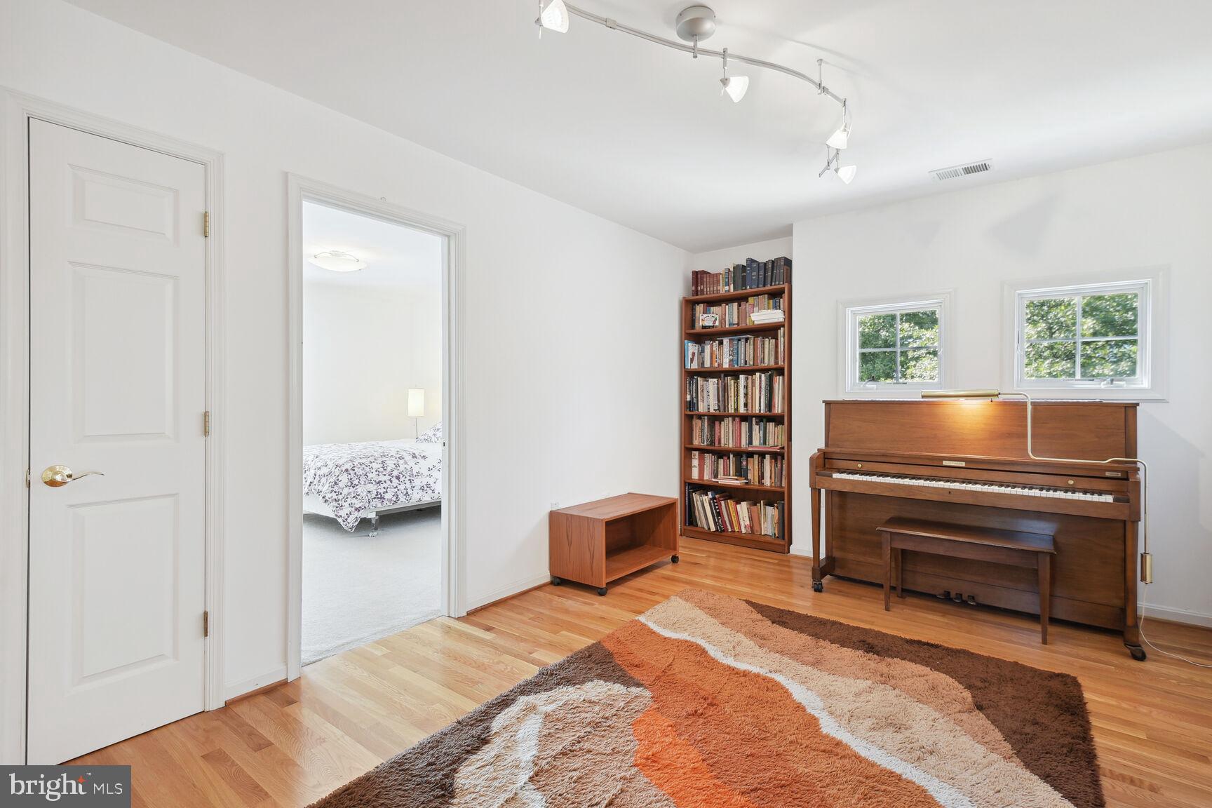 1507 Blue Meadow Road Potomac, MD 20854 - Photo 25 of 36 a bedroom with a bed and closet