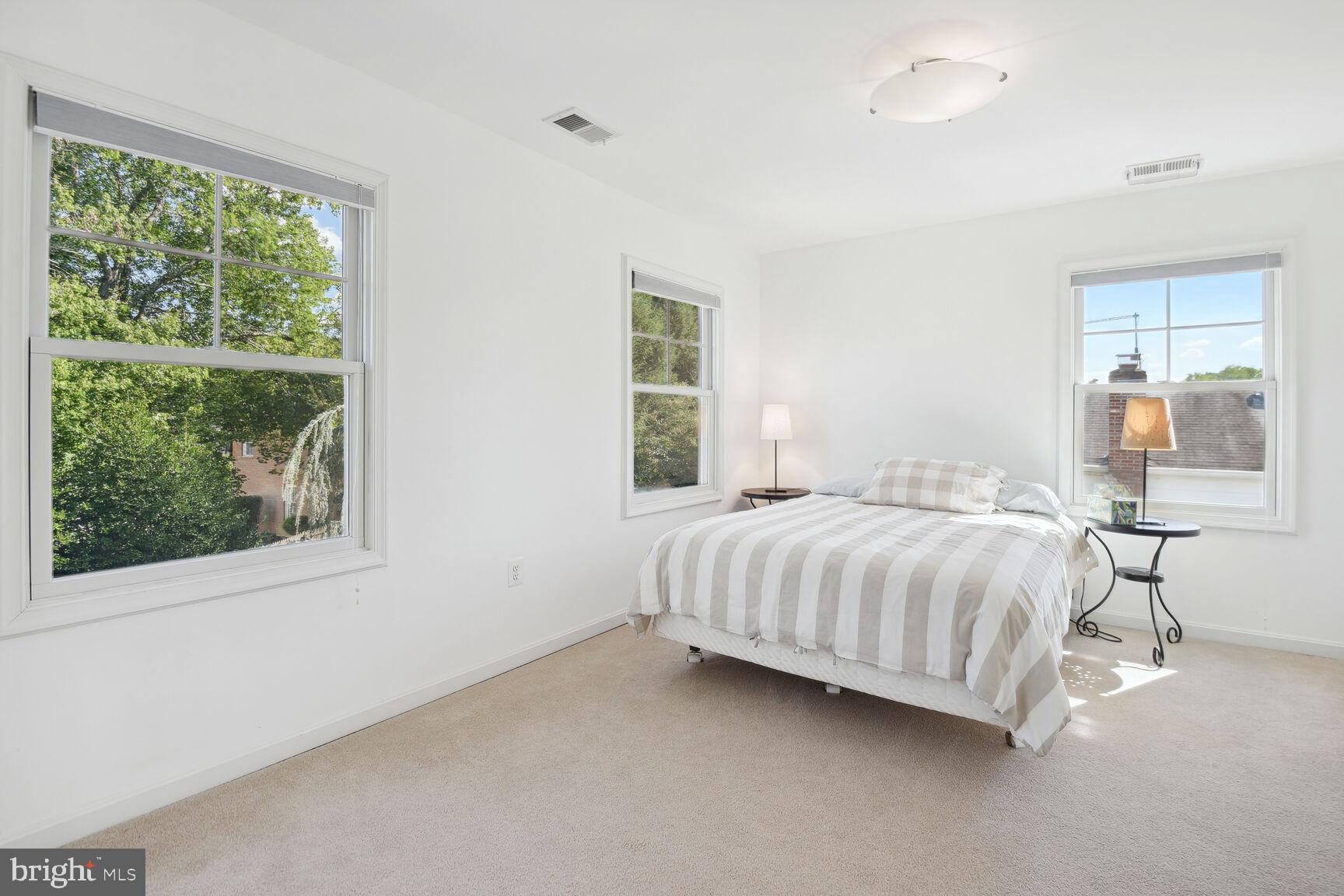 1507 Blue Meadow Road Potomac, MD 20854 - Photo 27 of 36 a bedroom with a bed and window