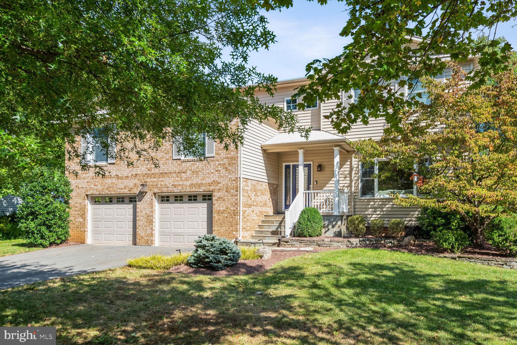 1507 Blue Meadow Road Potomac, MD 20854 - Photo 4 of 36 front view of house with a yard