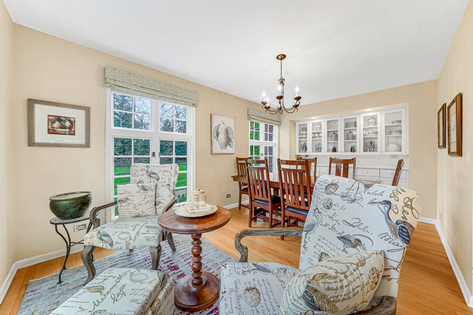 390 South Basswood Road Lake Forest, IL 60045 - Photo 6 of 24 a living room with furniture and a chandelier