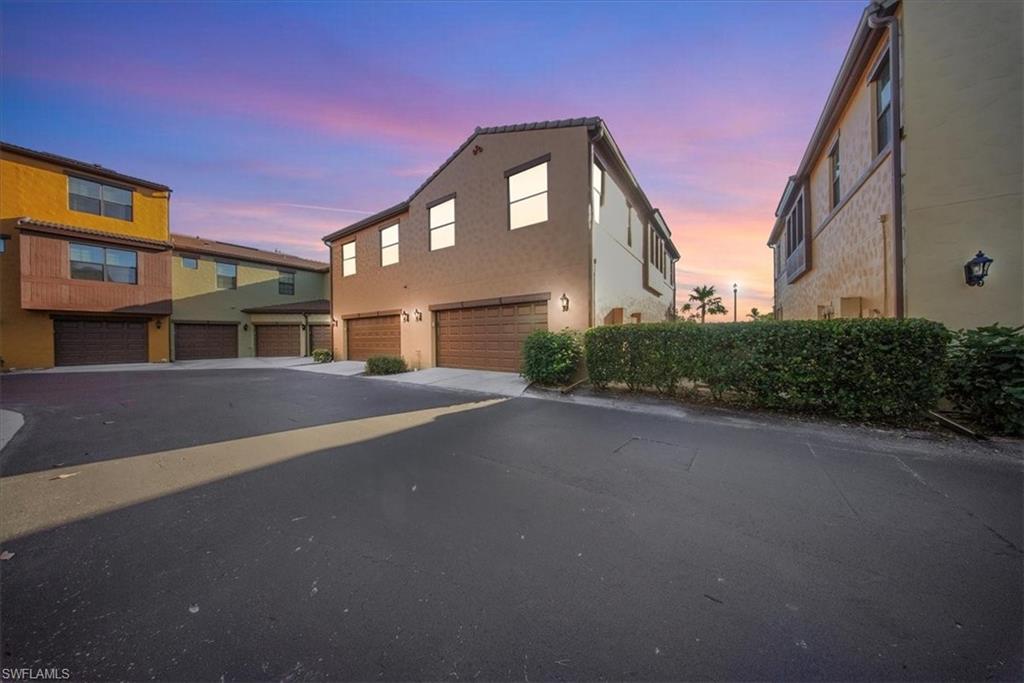 9063 Capistrano Street North, Unit 4401 Naples, FL 34113 - Photo 2 of 50 a front view of a building
