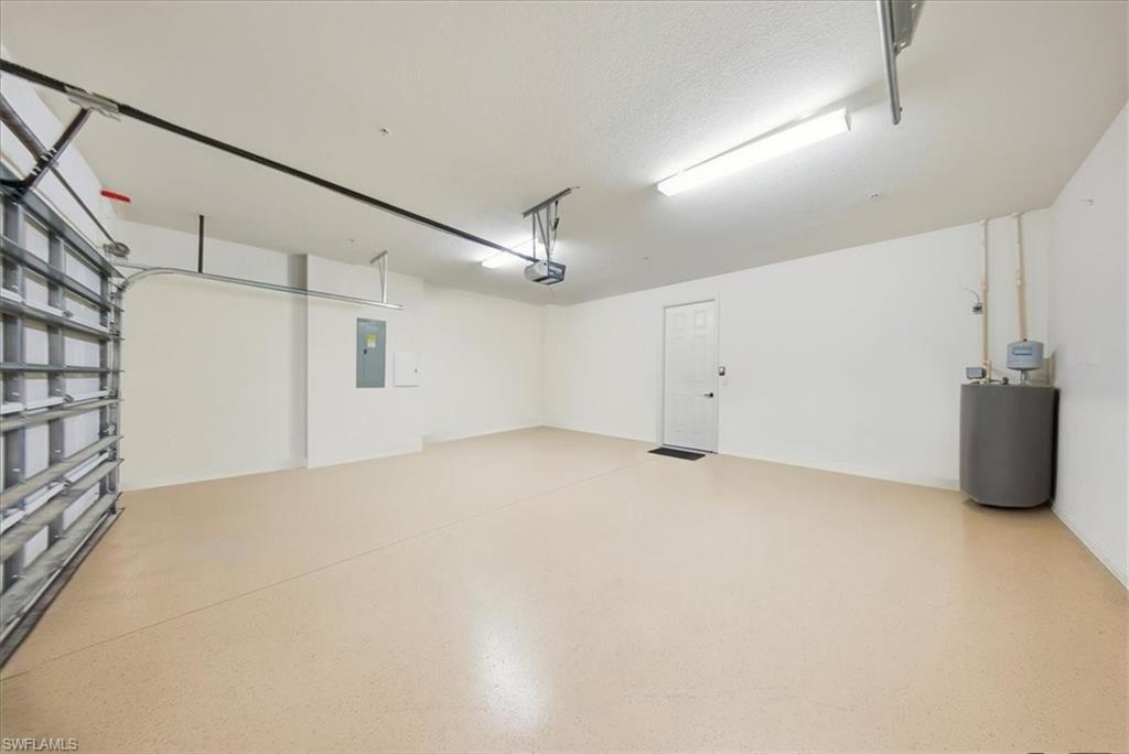 9063 Capistrano Street North, Unit 4401 Naples, FL 34113 - Photo 38 of 50 a view of a garage