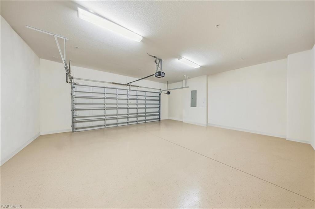 9063 Capistrano Street North, Unit 4401 Naples, FL 34113 - Photo 39 of 50 a view of a garage