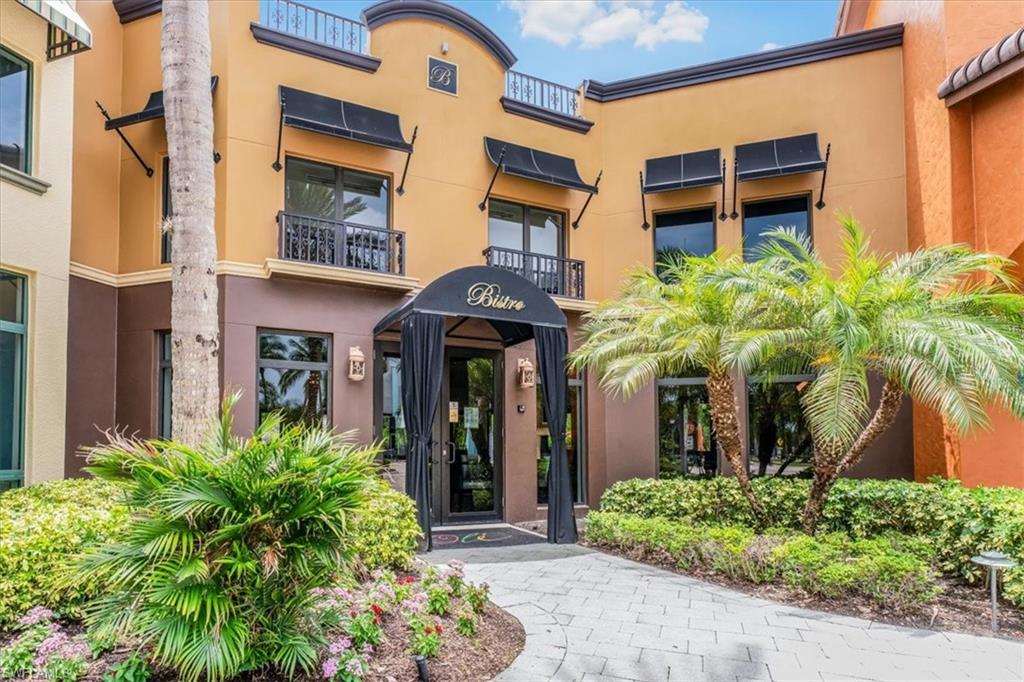 9063 Capistrano Street North, Unit 4401 Naples, FL 34113 - Photo 46 of 50 front view of a building