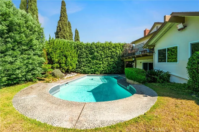 a view of outdoor space yard and swimming pool