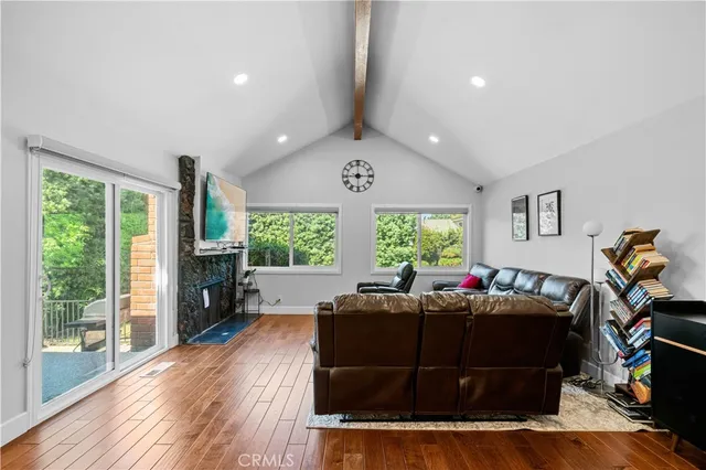 a view of a livingroom with furniture window and outside view