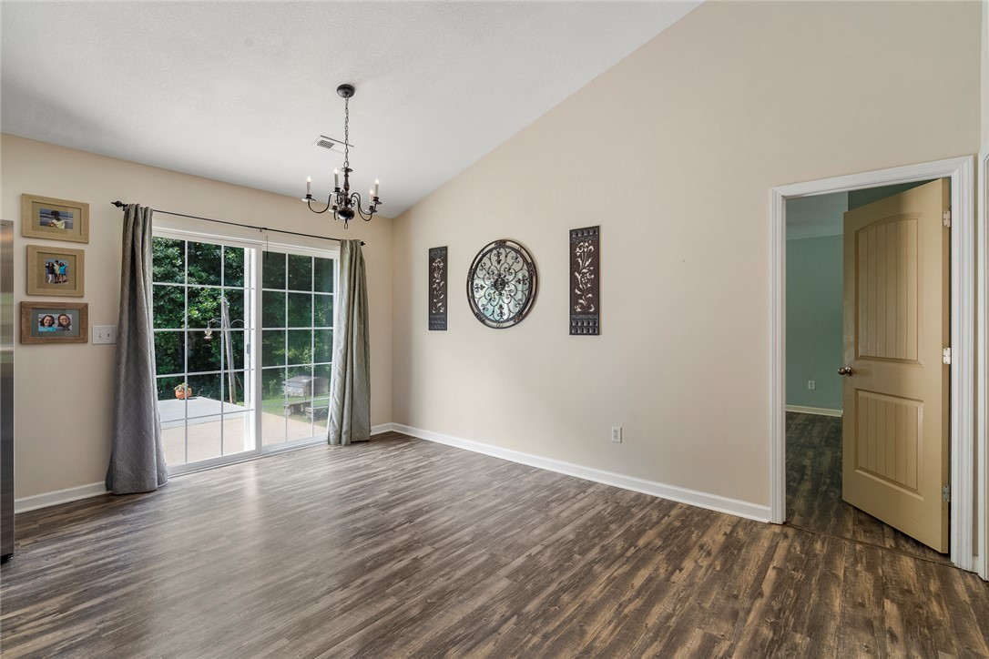 167 Mediterranean Avenue Anderson, SC 29621 - Photo 12 of 33 Sliding glass doors offer access to the outdoors from this versatile room.