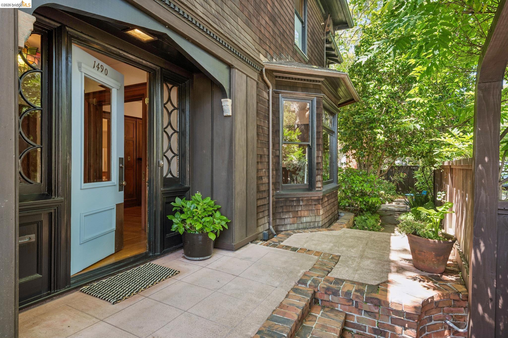 1490 Arch Street Berkeley, CA 94708 - Photo 4 of 57 a yellow house with outdoor space
