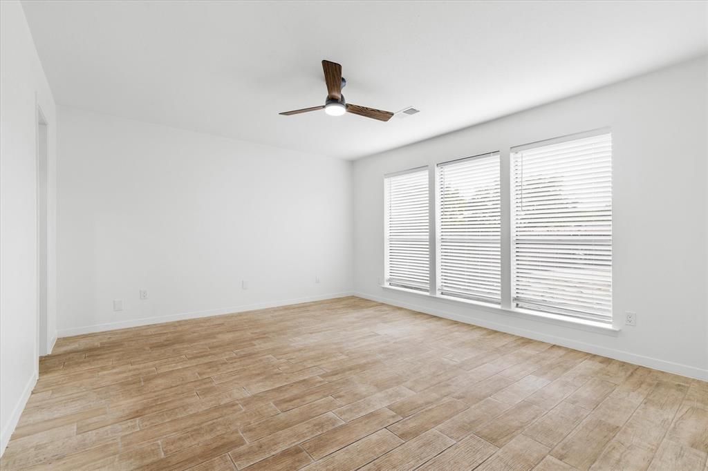 17003 Davenport Road Dallas, TX 75248 - Photo 30 of 40 a view of an empty room with a window