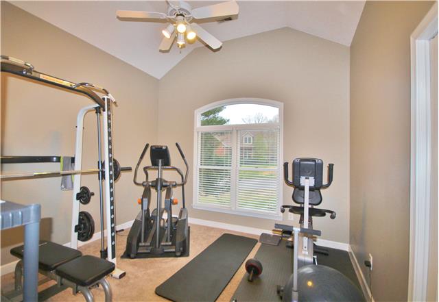 8213 Spring Ridge Drive Nashville, TN 37221 - Photo 14 of 20 Bedroom #3 is located on the main floor. It is currently being used as an exercise room.