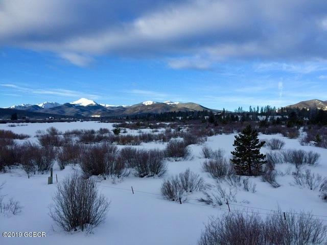 443 Muse Drive, Unit 2 Fraser, CO 80442 - Photo 22 of 26 a view of a town with mountains in the background
