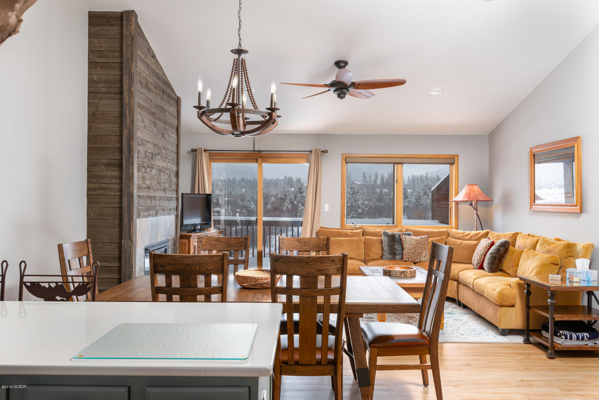 443 Muse Drive, Unit 2 Fraser, CO 80442 - Photo 9 of 26 a view of a dining room with furniture window and outside view