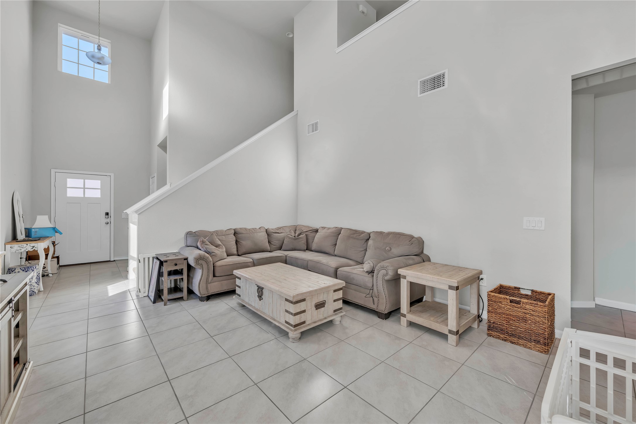 6813 Ranchito Drive Austin, TX 78744 - Photo 4 of 16 a living room with furniture and a couch