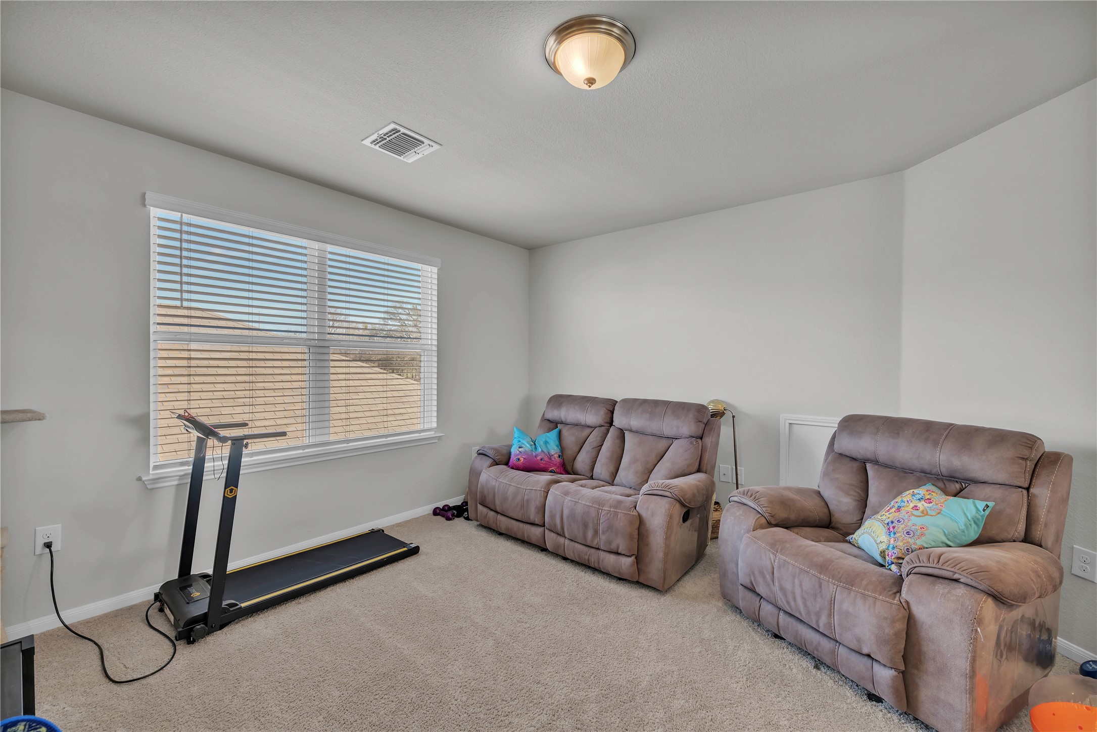 6813 Ranchito Drive Austin, TX 78744 - Photo 8 of 16 a living room with furniture and a window
