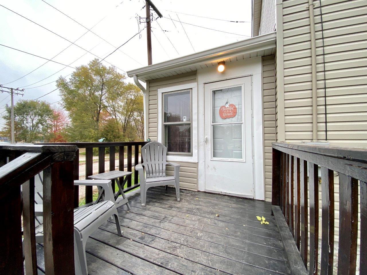 703 East Larue Street Streator, IL 61364 - Photo 3 of 38 a view of a brick house with a large window