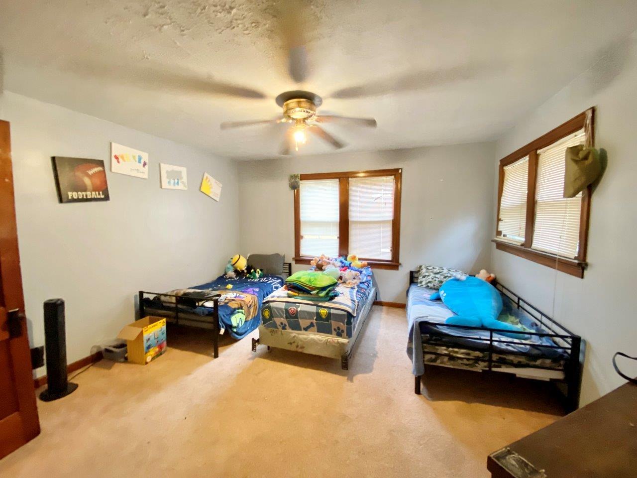 703 East Larue Street Streator, IL 61364 - Photo 22 of 38 a living room with furniture and a window