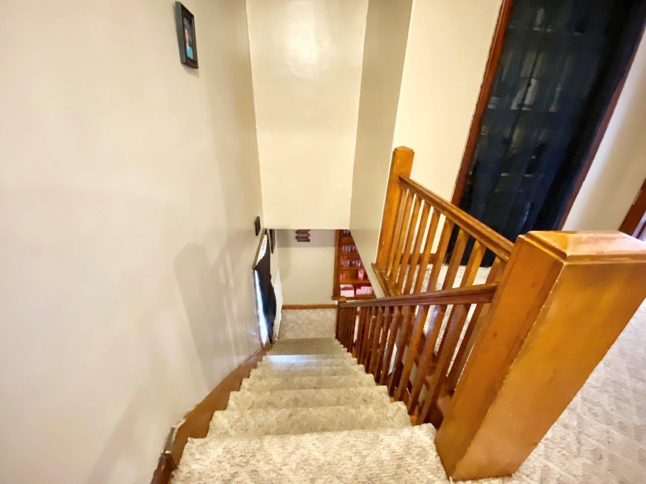 703 East Larue Street Streator, IL 61364 - Photo 23 of 38 a view of stairs and furniture
