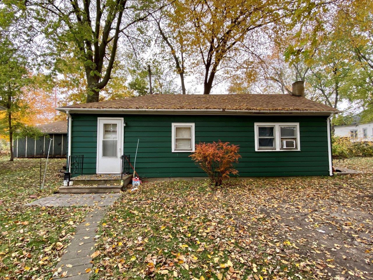 703 East Larue Street Streator, IL 61364 - Photo 27 of 38 a front view of a house with a tree
