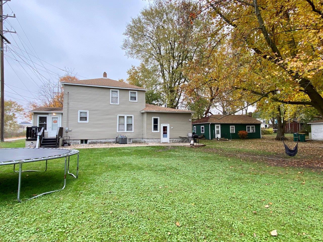 703 East Larue Street Streator, IL 61364 - Photo 32 of 38 a house view with a sitting space and garden
