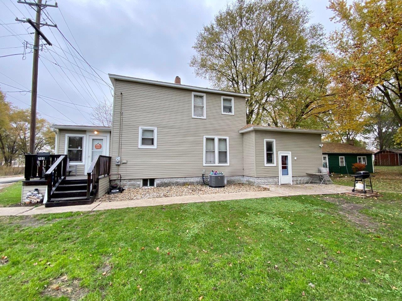 703 East Larue Street Streator, IL 61364 - Photo 37 of 38 a house view with a sitting space and garden