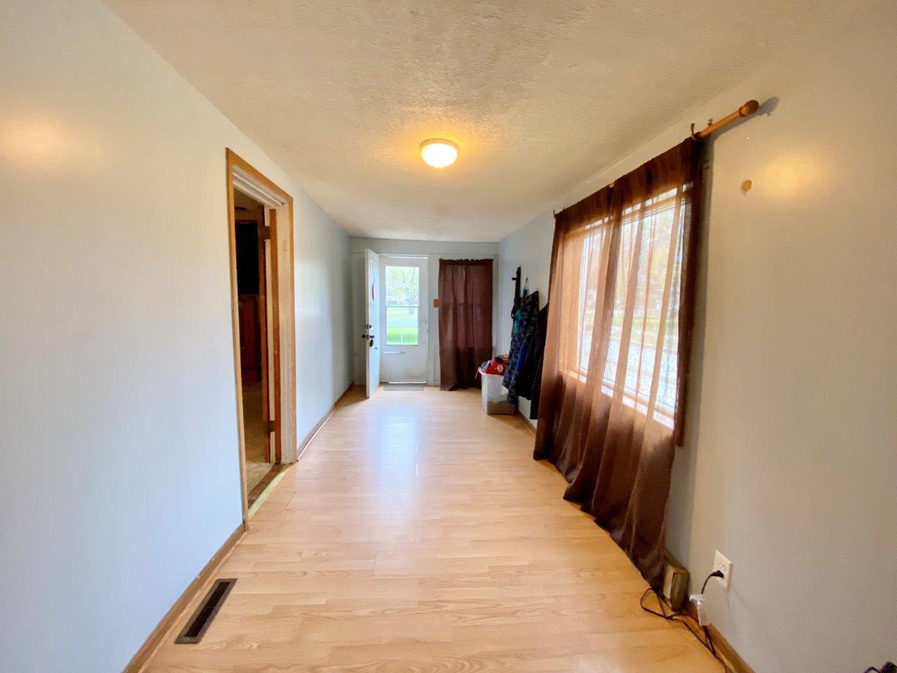 703 East Larue Street Streator, IL 61364 - Photo 5 of 38 a view of a room with windows