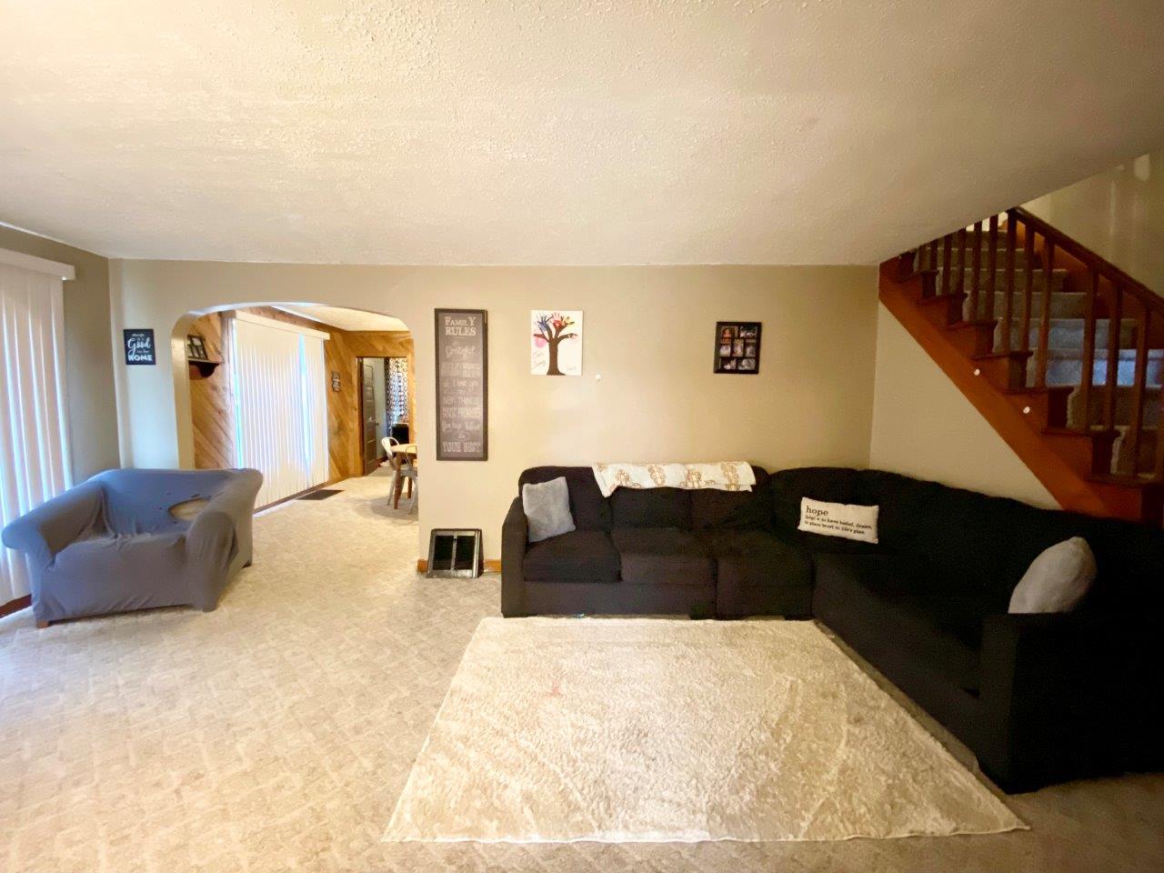 703 East Larue Street Streator, IL 61364 - Photo 6 of 38 a bedroom with furniture and a couch