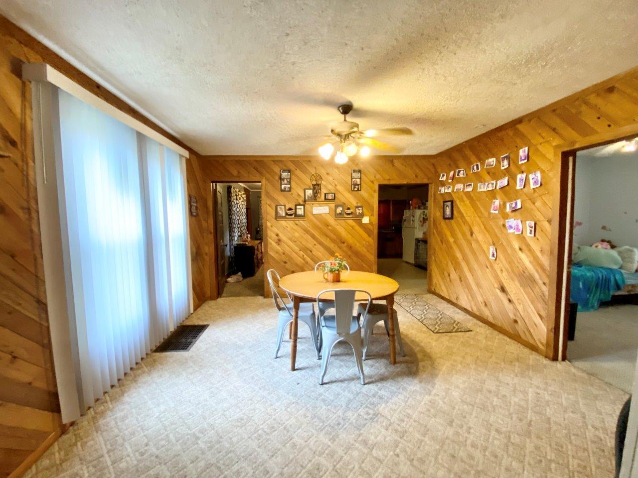 703 East Larue Street Streator, IL 61364 - Photo 9 of 38 a view of a livingroom with furniture and a window