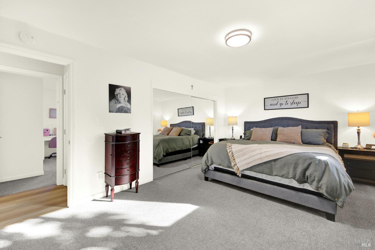 4118 Georgia Street Vallejo, CA 94591 - Photo 25 of 56 a spacious bedroom with a bed and a cabinets